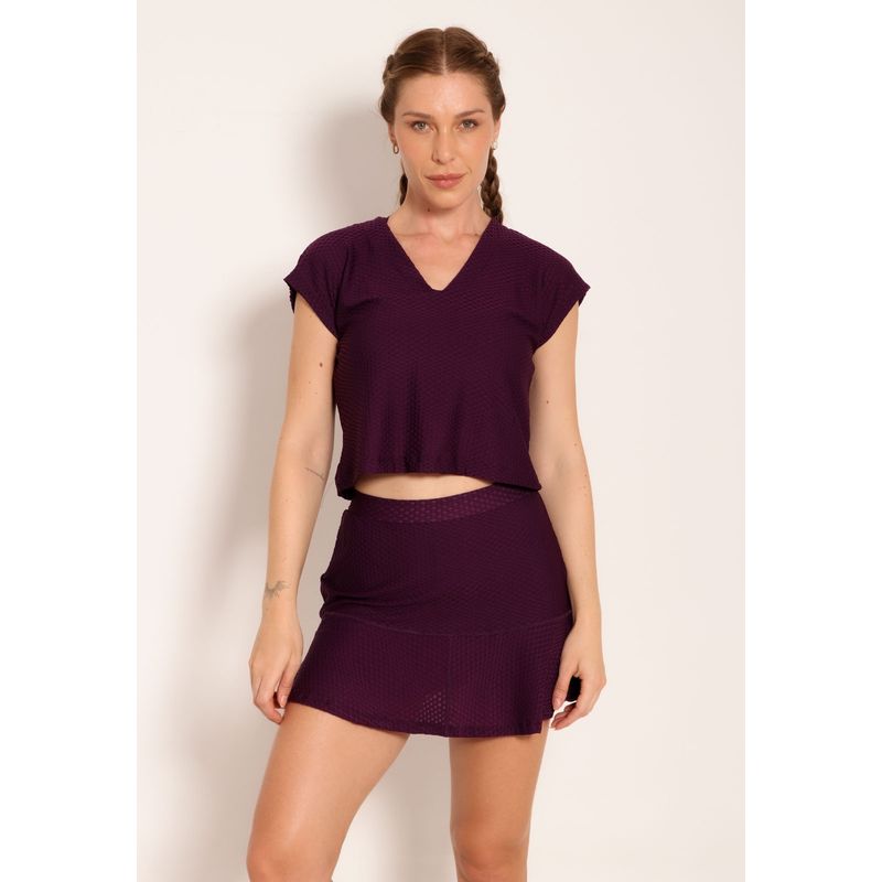 Conjunto Fitness de Blusa em Decote V e Shorts Saia London