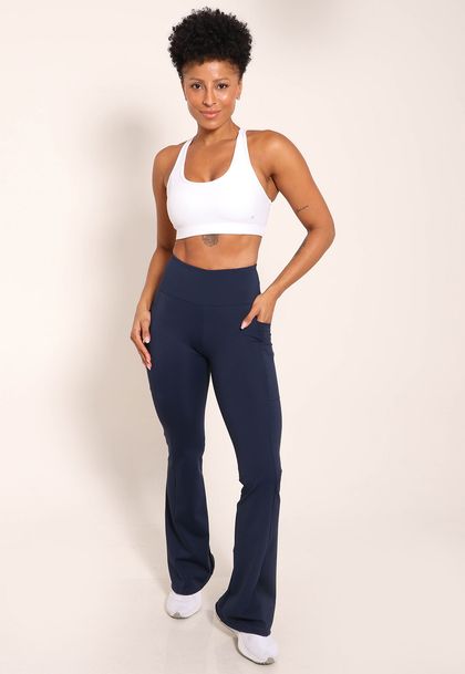 Calça Flare de Compressão Com Bolsos Laterias