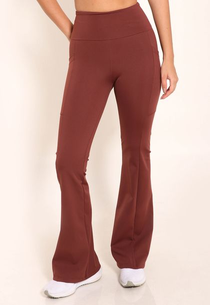 Calça Flare de Compressão Com Bolsos Laterias